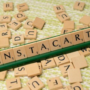 A wooden block with the word instacart written on it