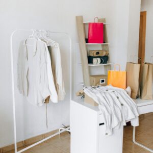 White Textile on White Wooden Table